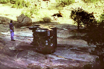 Land Rover on its side in Moab