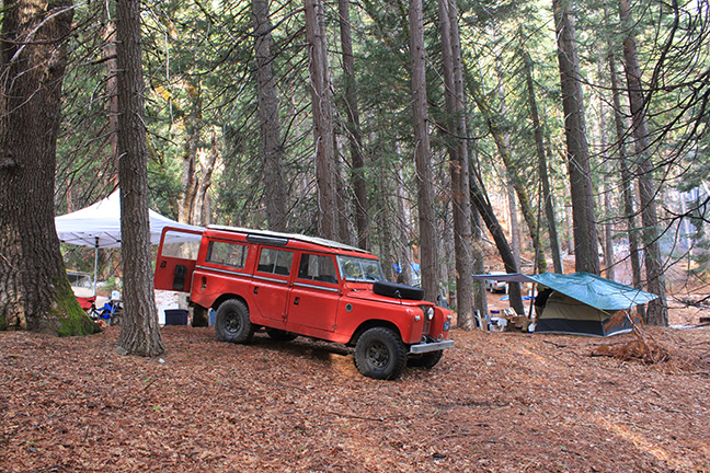 land Rover camping on hill