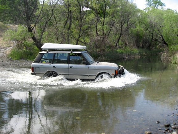 Range Rover crossing the lake